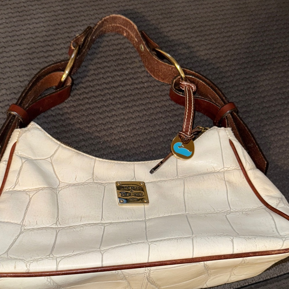 Dooney & Bourke White and Pink Leather shoulder Bag. Used but in Great condition